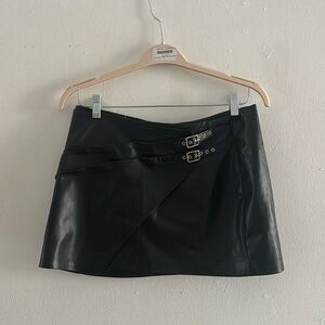 Brand new with tag Zara mini skirt, faux leather. Super chic!
